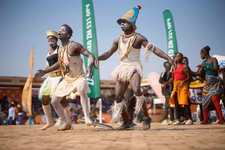As the sun slips below the horizon, singing, dancing, ululation and celebration continue into the night, and Mwata Kazembe retreats to his palace in preparations for the final and most important rite. (Image by Chona Mweemba for Nkwazi Magazine).