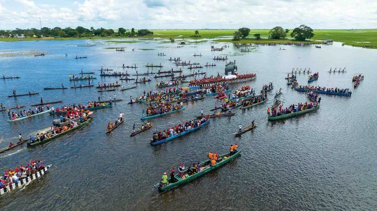 A procession of boats at the Kuomboka Ceremony. Image by Bwana Jimmy Productions for Nkwazi Magazine.