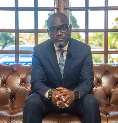 Dr Elias Munshya <br><span class='subtitle-style' > From Chiwempala to the World</span>