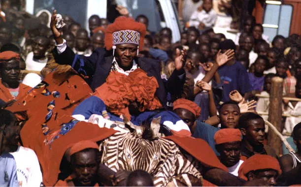 Feel history as the Mwata Kazembe celebrates with his sword during the July festivities.