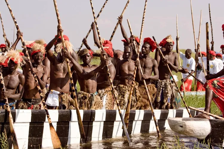 The Nalikwanda, the ceremonial canoe used in the Kuomboka, is a masterpiece of traditional craftsmanship, adorned with intricate carvings and symbols representing the Lozi's connection to their ancestors and the natural world.