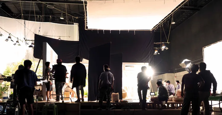 Behind the scenes of a video production.
