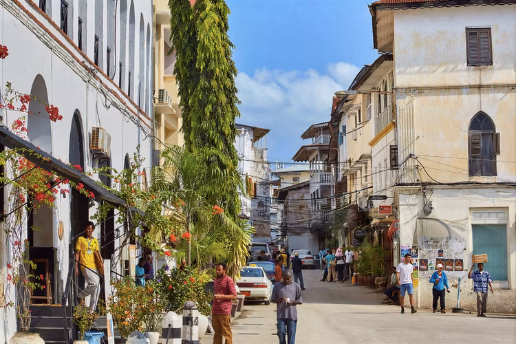 Stone Town is built from coral ragstone and mangrove timber, and it features narrow, winding streets, elaborately carved Zanzibar doors, and grand buildings dating from the 18th to 19th centuries.